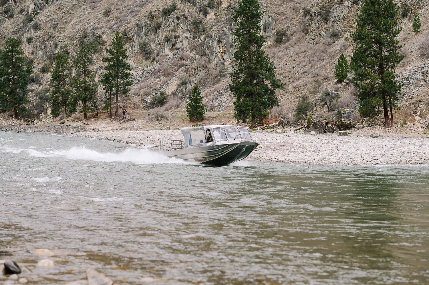 A jet boat runs through a rapid on the Salmon River during a scenic tour. 